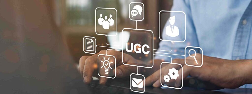 Unas manos escribiendo en el teclado con logos de UGC.